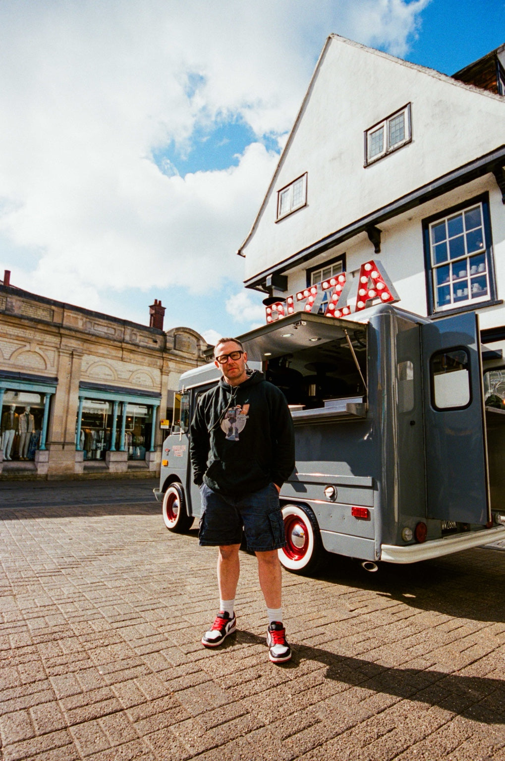 Peddling Pizza truck and merch